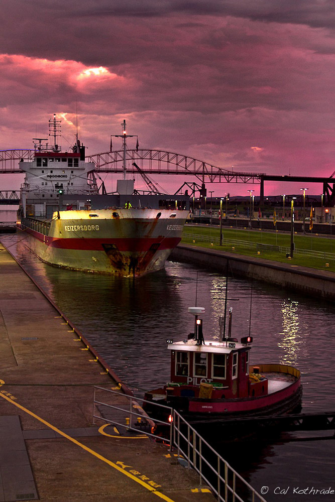 Soo Locks at sunset with freighter